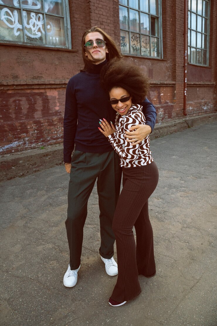 Rihanna Stuns in Grey Patou Look with Luxe Accessories While Giving Back in Harlem